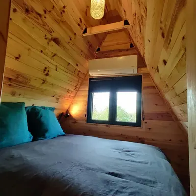 Un ou plusieurs lits dans un hébergement de l'établissement Tipi Dakota des monteaux