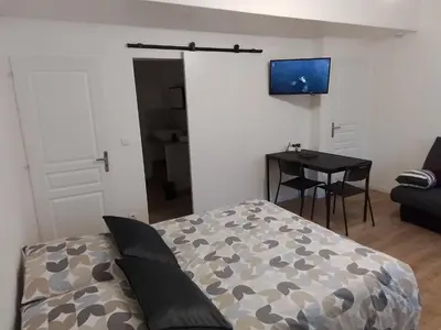Télévision ou salle de divertissement dans l'établissement Studio cosy