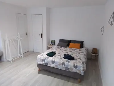Un ou plusieurs lits dans un hébergement de l'établissement Studio cosy