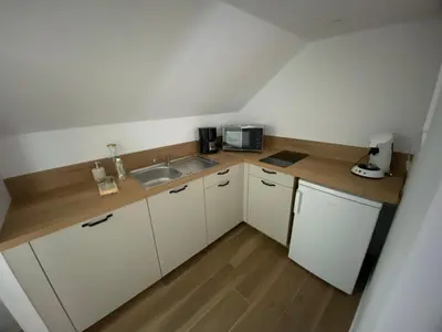 Cuisine ou kitchenette dans l'établissement L auvetia studio 150 circuit 24h