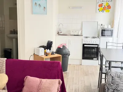 Cuisine ou kitchenette dans l'établissement Escale 12