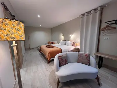 Un ou plusieurs lits dans un hébergement de l'établissement Le Chalet du Gîte de la Besnardière