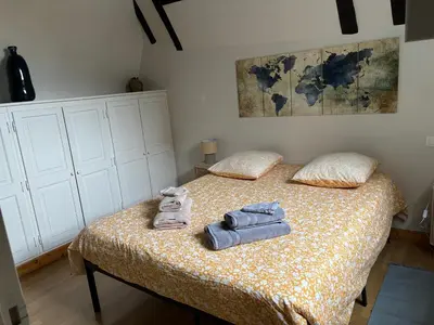 Un ou plusieurs lits dans un hébergement de l'établissement Appartement au centre de Richelieu