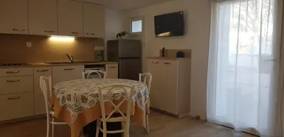 Cuisine ou kitchenette dans l'établissement Les appartements de Mansart