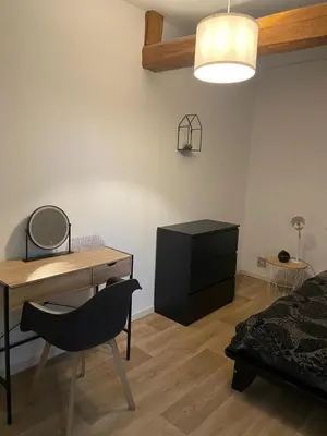 Un ou plusieurs lits dans un hébergement de l'établissement Maison proche circuit le Mans