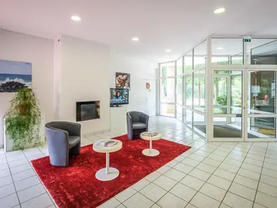 Télévision ou salle de divertissement dans l'établissement Holiday Home Cottage Confort-2 by Interhome