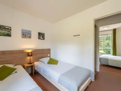 Un ou plusieurs lits dans un hébergement de l'établissement Holiday Home Cottage Confort-4 by Interhome