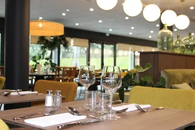 Restaurant ou autre lieu de restauration dans l'établissement Résidence Montana Le Mans