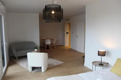 Coin salon dans l'établissement Résidence Montana Le Mans