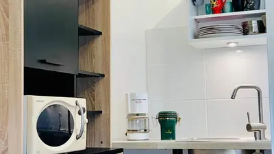 Cuisine ou kitchenette dans l'établissement 