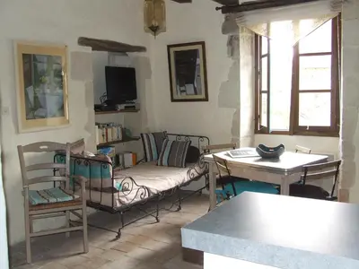 Télévision ou salle de divertissement dans l'établissement Gîte de charme La Forge