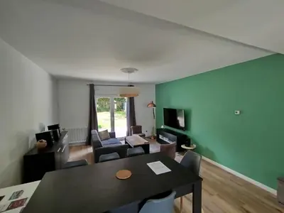 Télévision ou salle de divertissement dans l'établissement Maison 3 chambres Le Mans