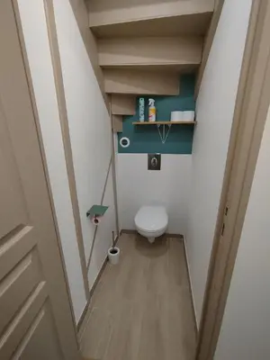 Un ou plusieurs lits dans un hébergement de l'établissement Maison 3 chambres Le Mans