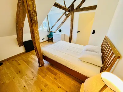 Un ou plusieurs lits dans un hébergement de l'établissement Le BIG duplex, hypercentre, 4 chambres, spacieux