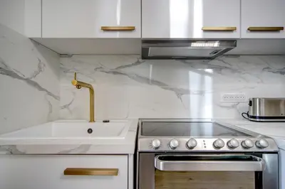 Cuisine ou kitchenette dans l'établissement La Suite du Roi Henri