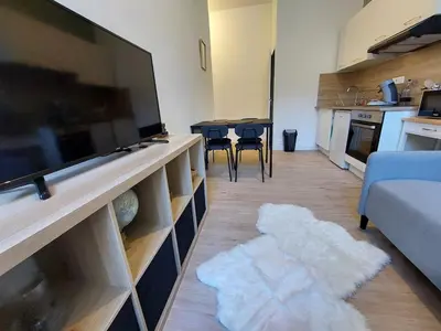 Cuisine ou kitchenette dans l'établissement L'Urbain