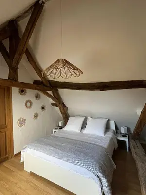 Un ou plusieurs lits dans un hébergement de l'établissement CHAMBRES D'HOTES EpLABONNE