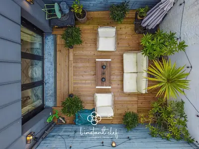 Jardin de l'établissement Maison avec terrasse parfaite pour les 24H et GP Moto
