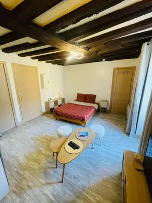 Un ou plusieurs lits dans un hébergement de l'établissement Le Studio du Vieux-Mans - 2 guests - Wifi