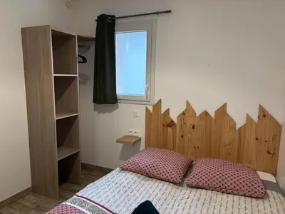 Un ou plusieurs lits dans un hébergement de l'établissement Gîte à la campagne 2