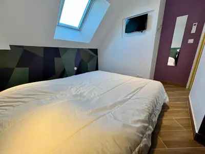 Un ou plusieurs lits dans un hébergement de l'établissement T3 climatisé face Loire et château l'appart du 4-1