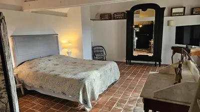 Un ou plusieurs lits dans un hébergement de l'établissement L'Olivier - Charm and elegance Loire Valley
