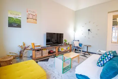 Télévision ou salle de divertissement dans l'établissement Le 54 - Tours