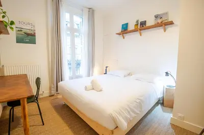 Un ou plusieurs lits dans un hébergement de l'établissement Le 54 - Tours