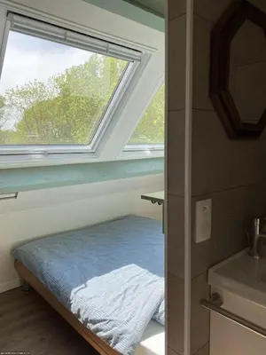 Un ou plusieurs lits dans un hébergement de l'établissement Le Refuge des Châteaux