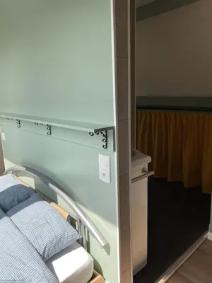 Un ou plusieurs lits dans un hébergement de l'établissement Le Refuge des Châteaux