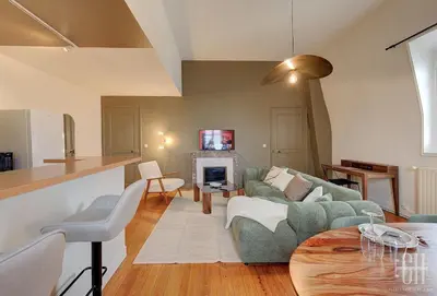 Télévision ou salle de divertissement dans l'établissement Appartement avec chambre, parking, bureau, wifi