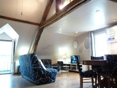 Coin salon dans l'établissement Le Plessis, Stone Farmhouse Loft with Gardens and Pool