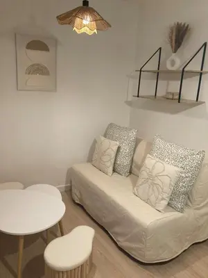 Coin salon dans l'établissement Studio Le nid charmant