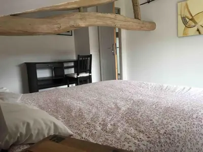 Un ou plusieurs lits dans un hébergement de l'établissement Maison rénovée en tuffeau