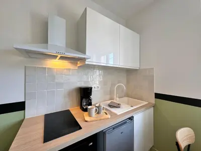 Cuisine ou kitchenette dans l'établissement Les studios de la gare - Centre Le Mans - Calme