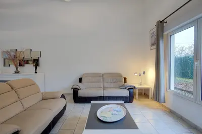 Coin salon dans l'établissement La maison en bois - 6 personnes