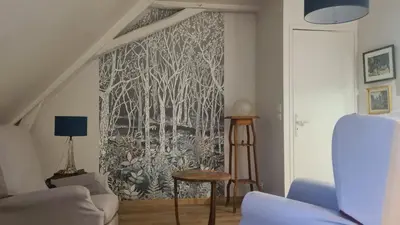 Coin salon dans l'établissement gite au jardin de grand-père