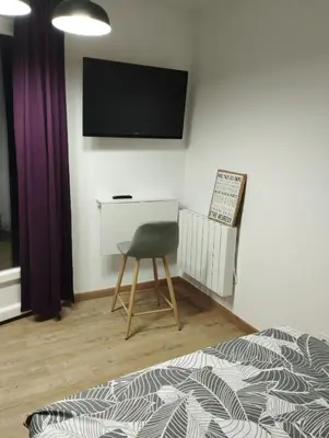 Télévision ou salle de divertissement dans l'établissement La room