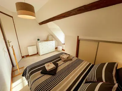 Un ou plusieurs lits dans un hébergement de l'établissement Gîte viticole tout inclus, jardin 3000m², vélos offerts, proche Saumur-Chinon-Langeais - FR-1-381-606