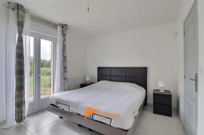 Un ou plusieurs lits dans un hébergement de l'établissement La Tuilerie - Family home