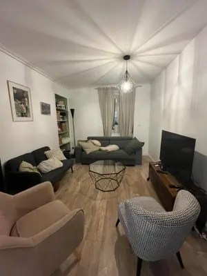 Coin salon dans l'établissement Maison 6 personnes - Idéal 24h du Mans