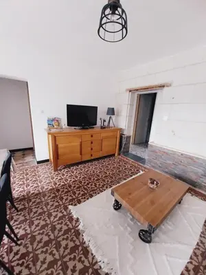 Télévision ou salle de divertissement dans l'établissement Entre Loire & Vignes