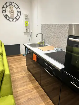 Coin salon dans l'établissement Magnifique appartement