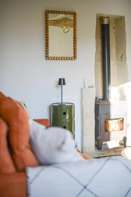 Un ou plusieurs lits dans un hébergement de l'établissement Maison de charme avec Jacuzzi