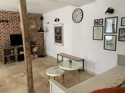 Coin salon dans l'établissement Maison Gite des Belles Demois Ailes