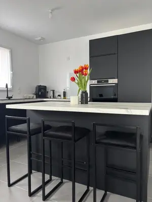 Cuisine ou kitchenette dans l'établissement Chambre chez l habitant proche circuit des 24h