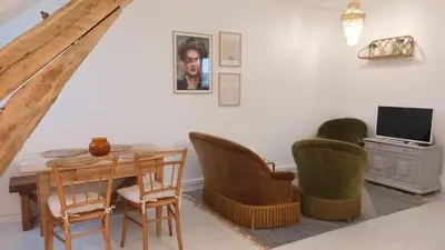 Télévision ou salle de divertissement dans l'établissement Le Perchoir des Prébendes - wifi - TV