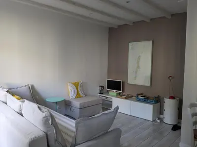 Télévision ou salle de divertissement dans l'établissement T2 Au pied du château sans vis à vis