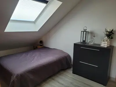 Un ou plusieurs lits dans un hébergement de l'établissement Maison proche du circuit des 24h du Mans