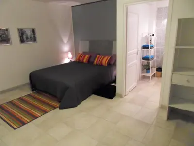 Un ou plusieurs lits dans un hébergement de l'établissement Madinina'S Cube